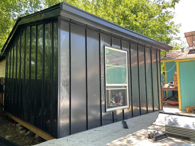 Black standing seam metal wall panels for Roof Inspection in Leitchfield